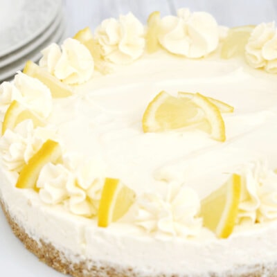 a no bake lemon cheesecake on a serving plate.