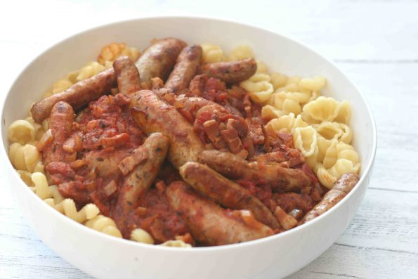 sausage casserole in a large white bowl