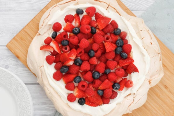 Pavlova on a serving board.