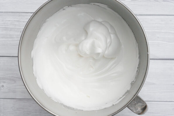 Unbaked meringue in a mixing bowl.