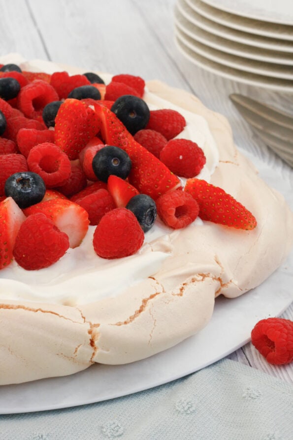 Pavlova on a serving plate. 