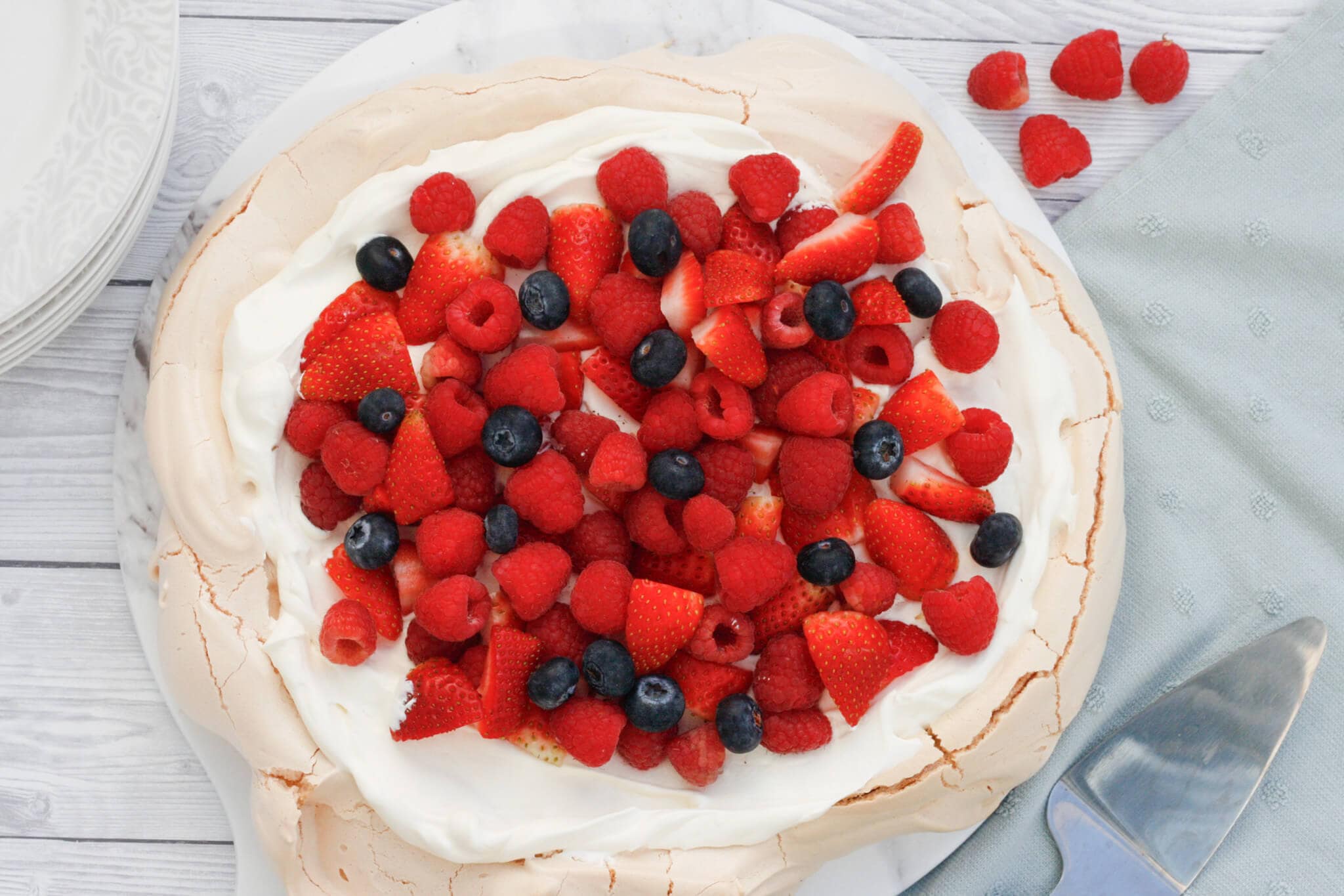 Mary Berry pavlova on a serving plate.