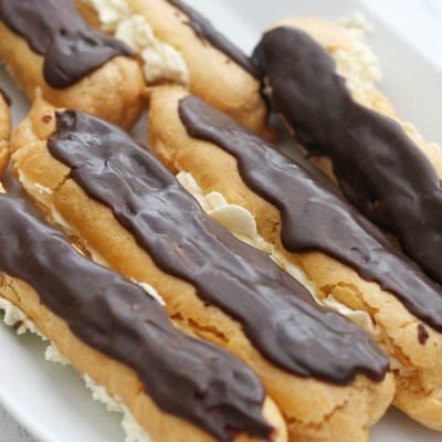 chocolate eclairs on a plate