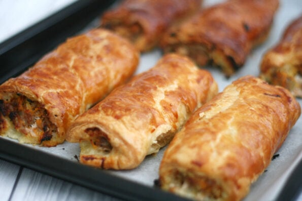 homemade sausage rolls on a baking tray