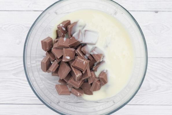 chocolate and condensed milk in a glass bowl.