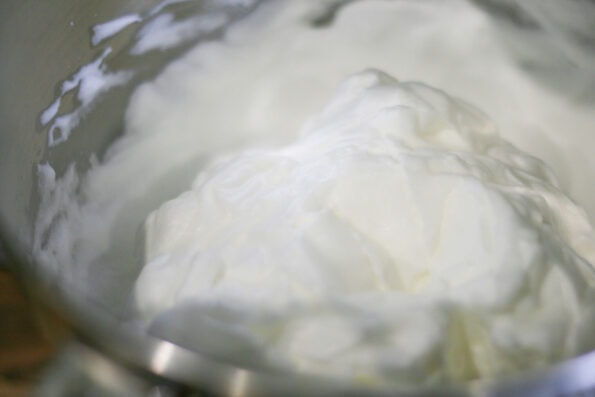 whipped egg white in a bowl.