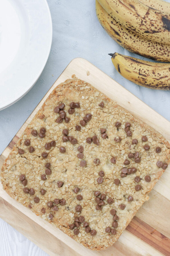 banana oatmeal bars on a wooden plate.