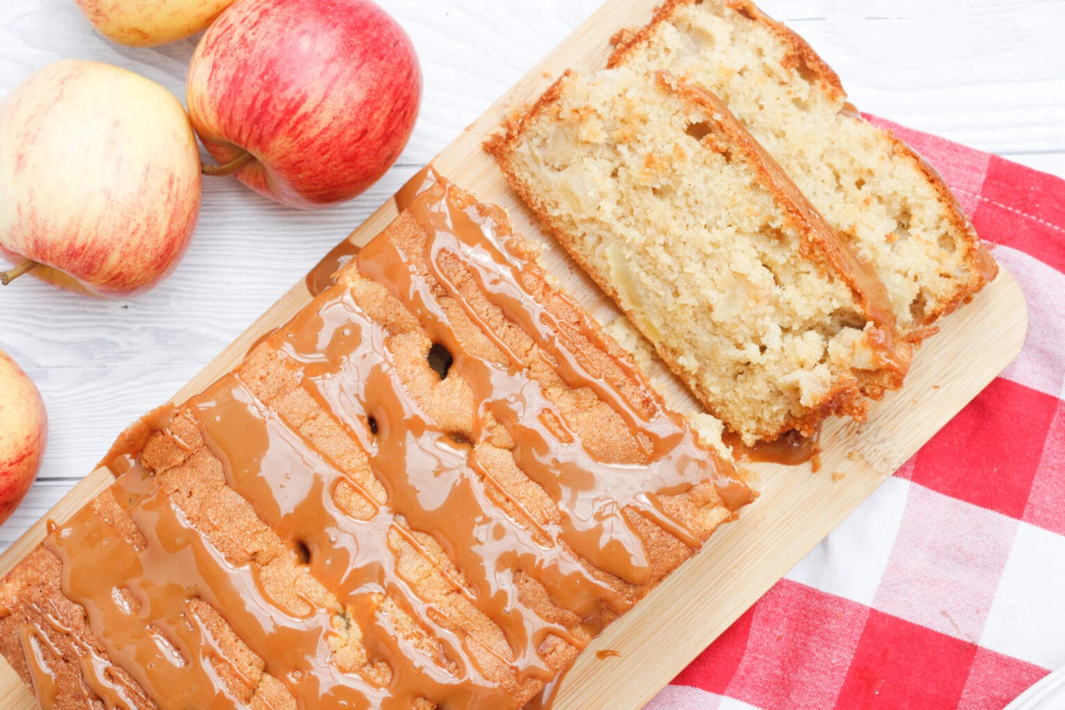 A delicious apple loaf cake, full of apples and drizzled with caramel