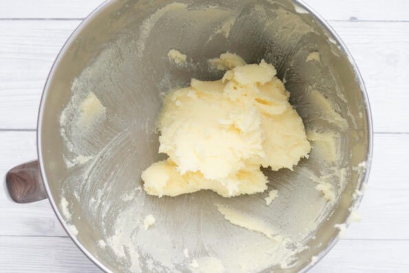 butter and sugar creamed together in a mixing bowl.