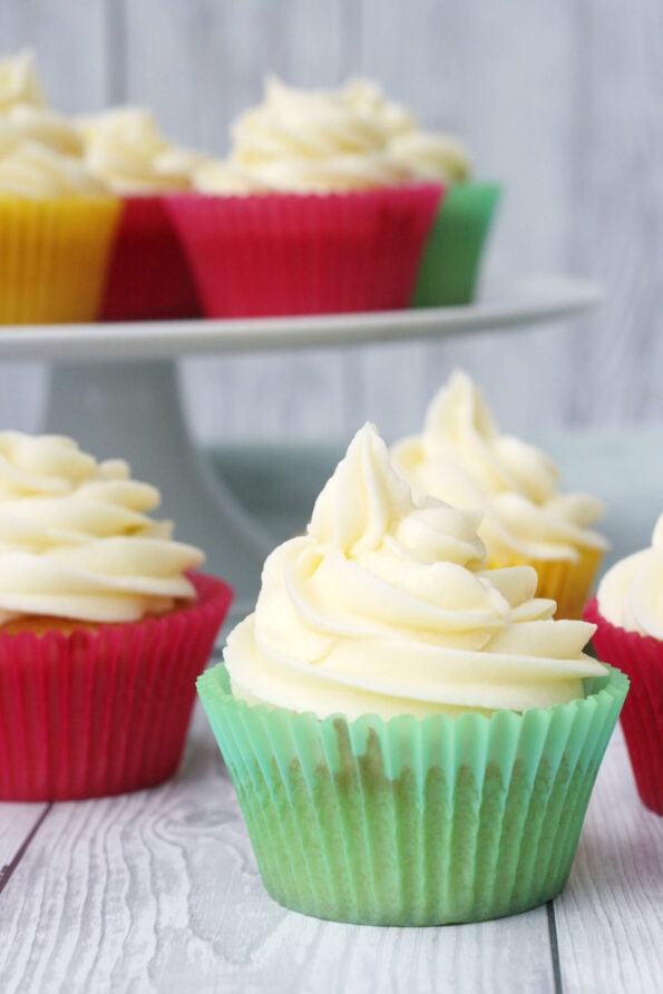 vanilla cupcakes on a serving plate