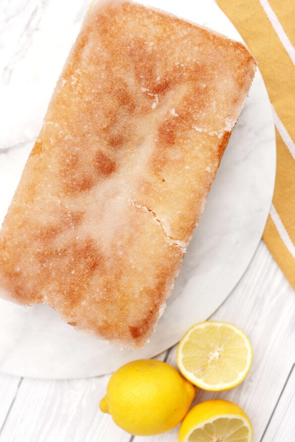 lemon drizzle cake on a serving plate