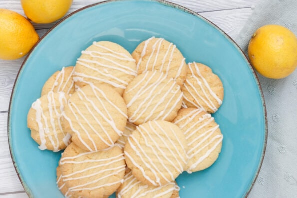 Lemon biscuits on a blue plate.