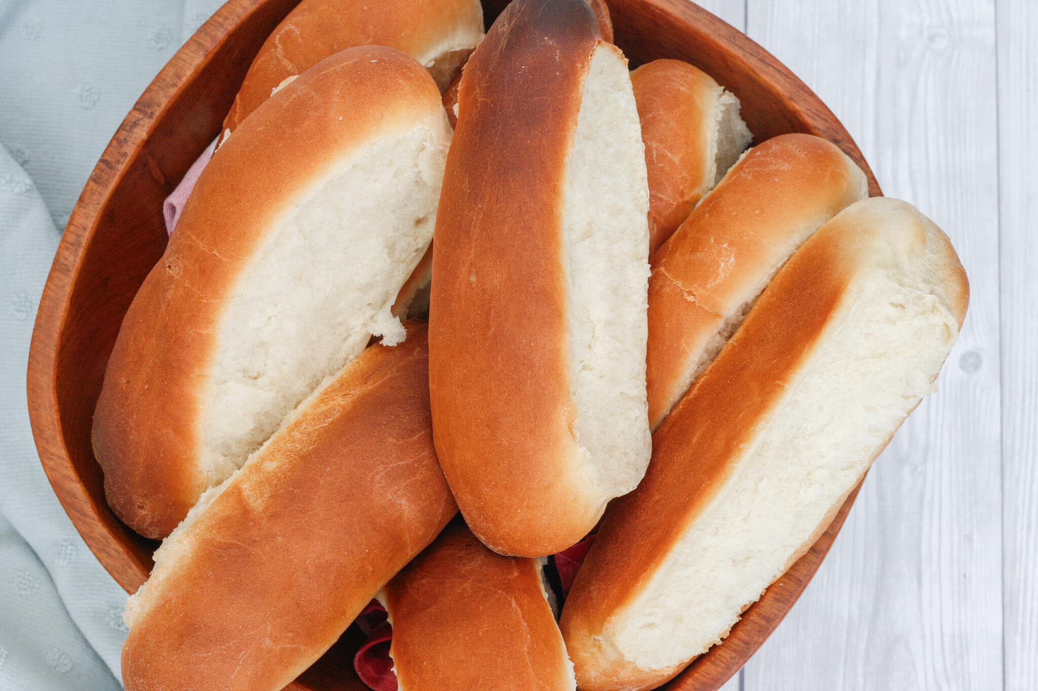 finger rolls in a wooden bowl.