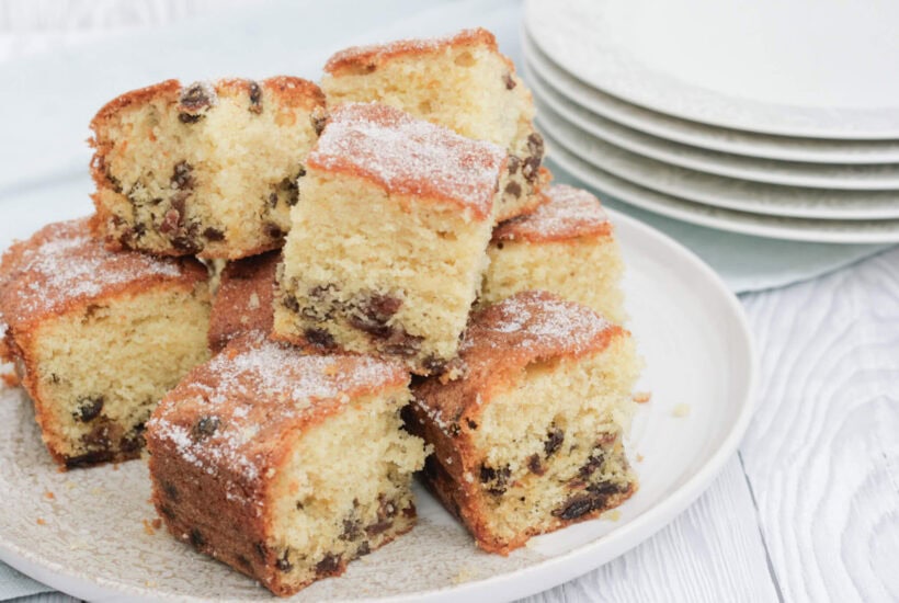 sultana cake on a serving plate.