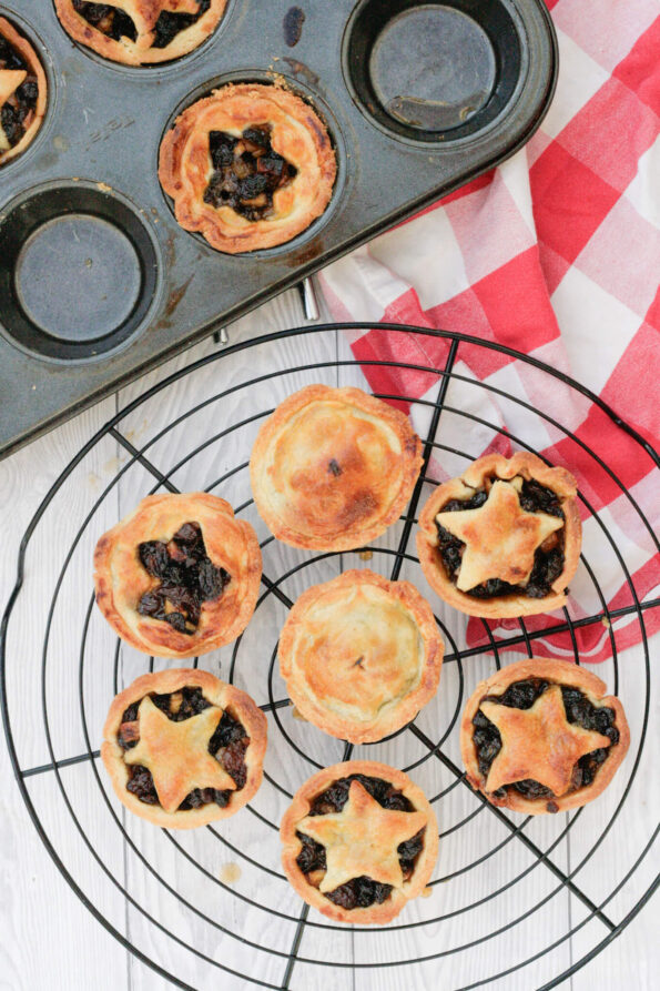 mince pies on a wire rack.