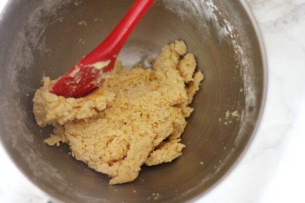 orange biscuit dough in a bowl