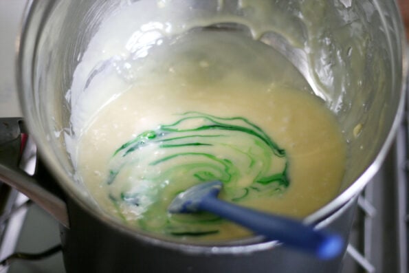 stirring in green food colouring to fudge