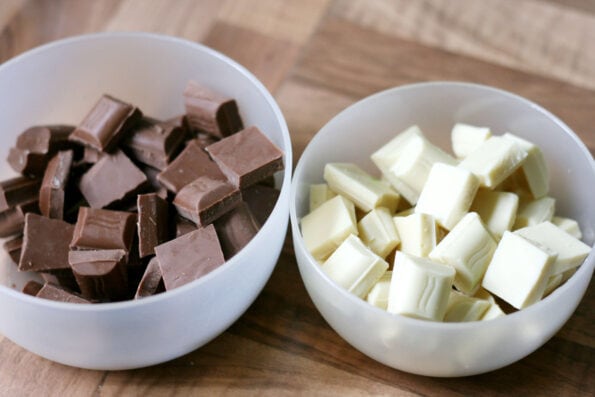 milk chocolate and white chocolate in two bowls