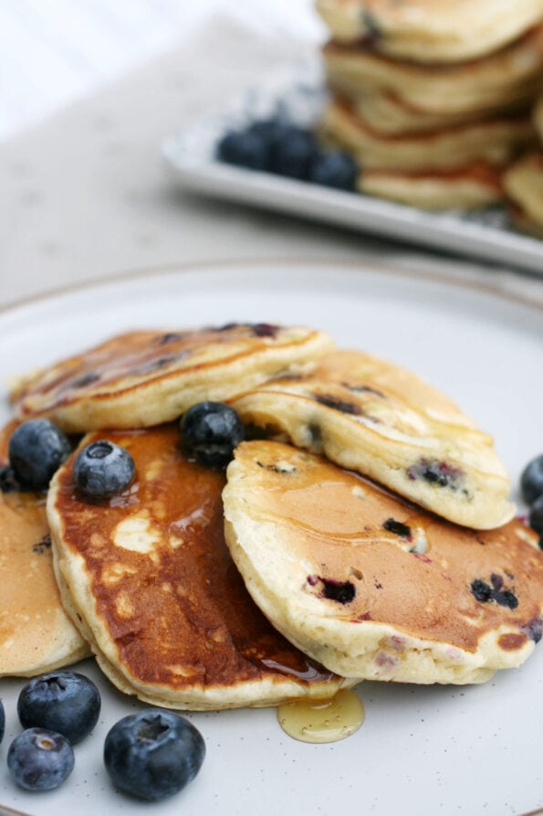 american style blueberry pancakes on a serving plate