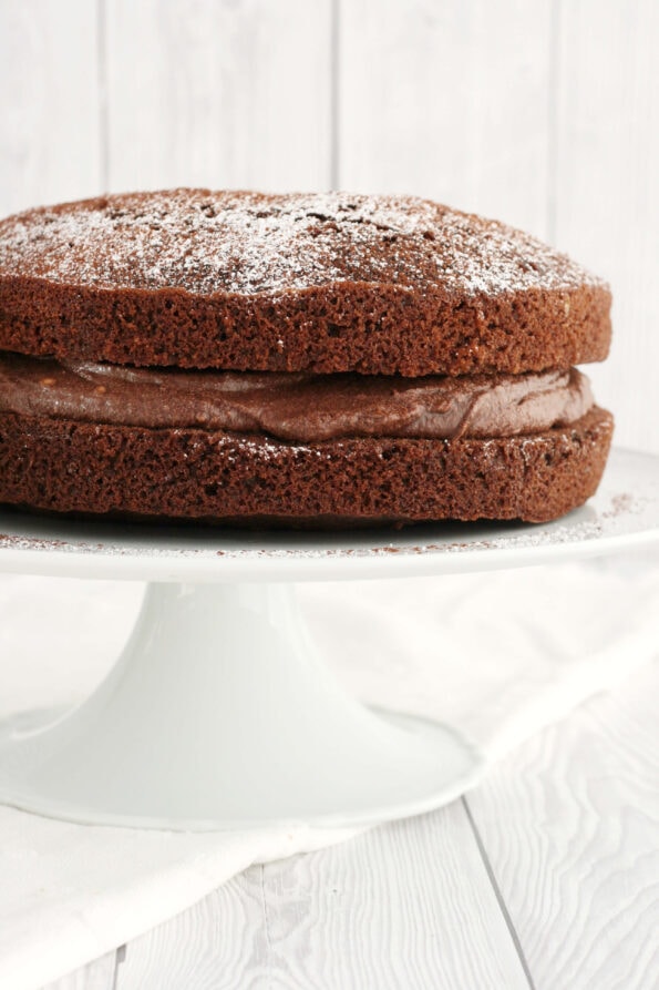 chocolate victoria sponge on a serving plate