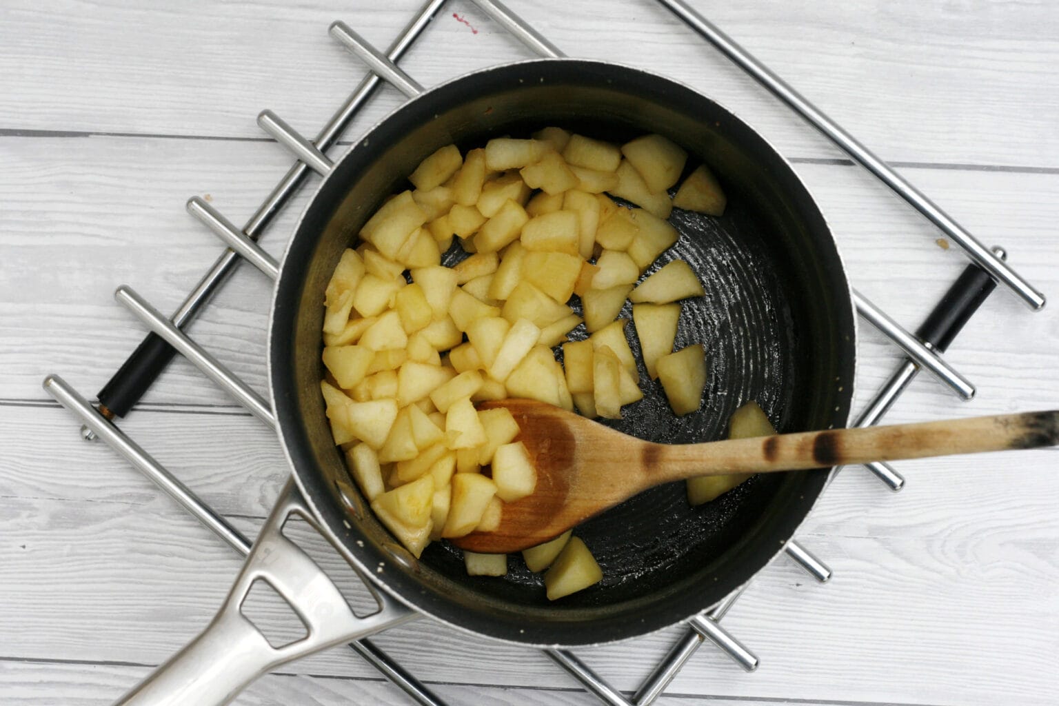 Put the apples into a small pan with the tablespoon of sugar and a ...