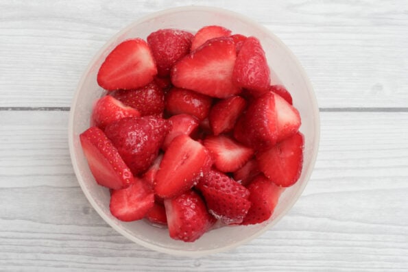 strawberries cut up in a small bowl.