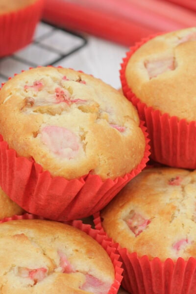 rhubarb muffins on a serving board.