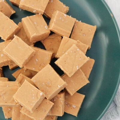 salted caramel pieces on a green plate.