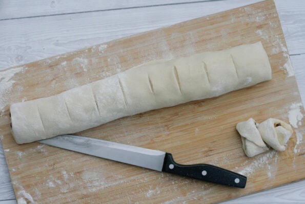 cutting mincemeat cinnamon rolls.