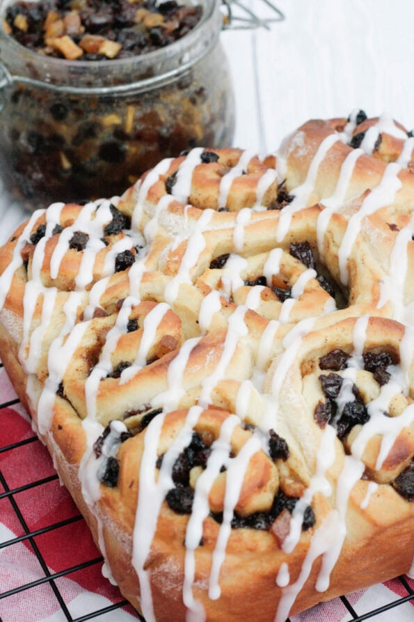 mincemeat cinnamon rolls on a wire rack.