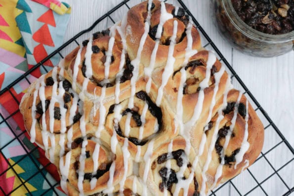 mincemeat cinnamon rolls on a wire rack.