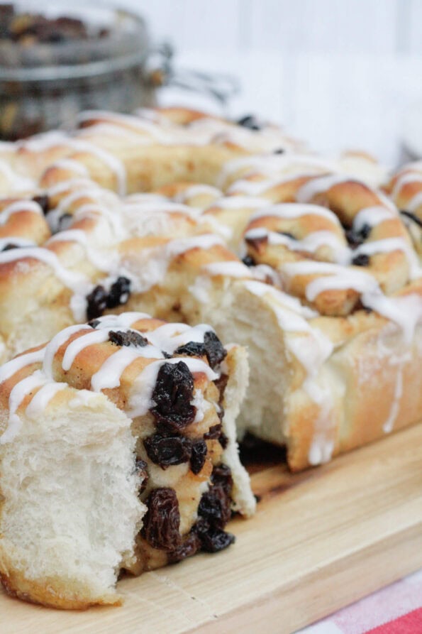 mincemeat cinnamon rolls on a wooden board.