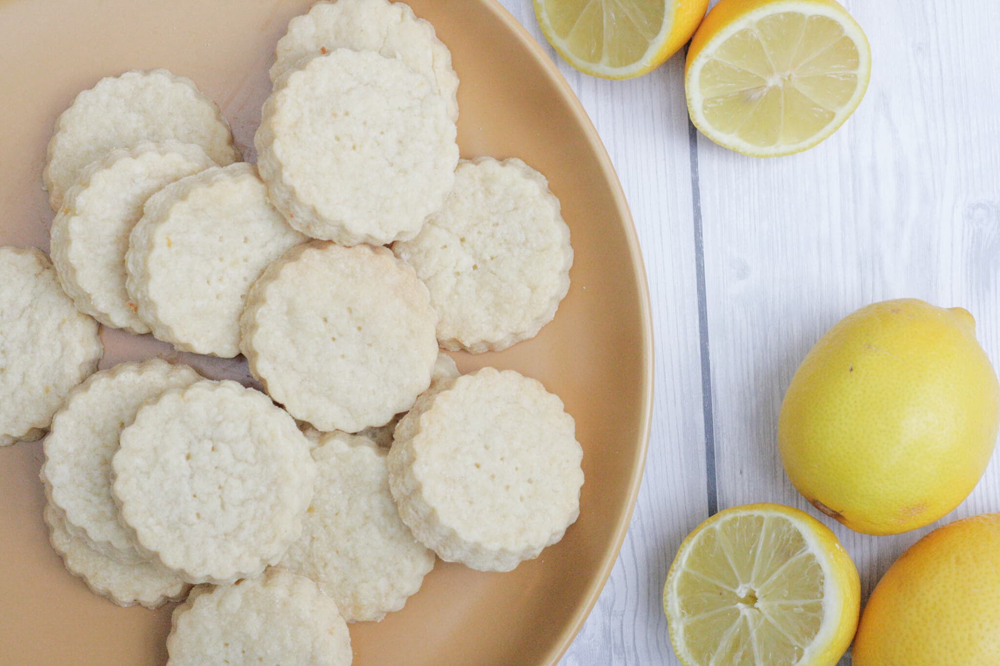lemon shortbread on a yellow plate.