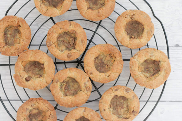 cookie cups on a wire rack.
