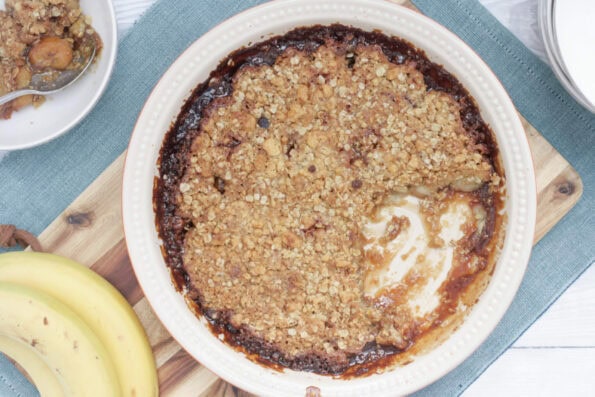 caramelised banana crumble in a serving dish.