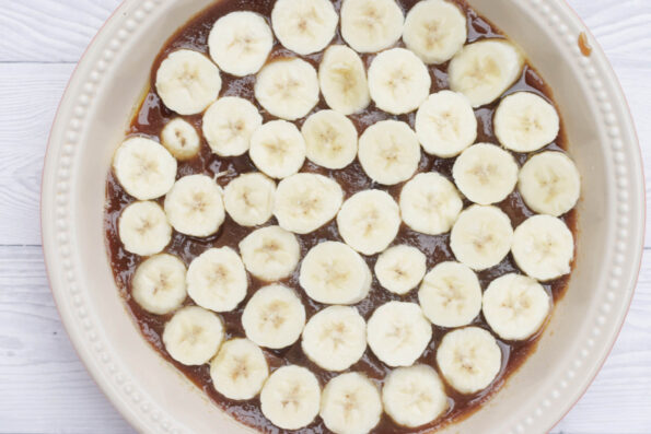 banana slices arranged in a round dish.