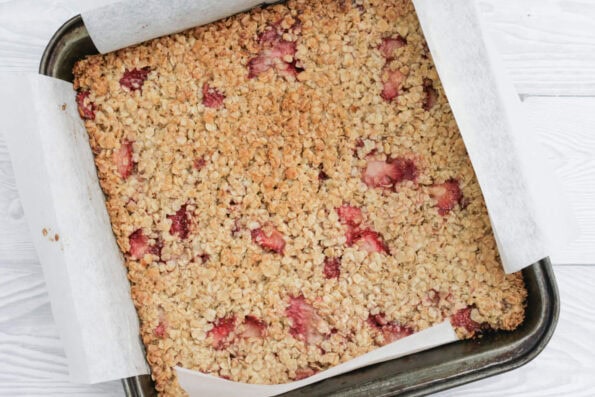 strawberry flapjacks baked in a baking tin.