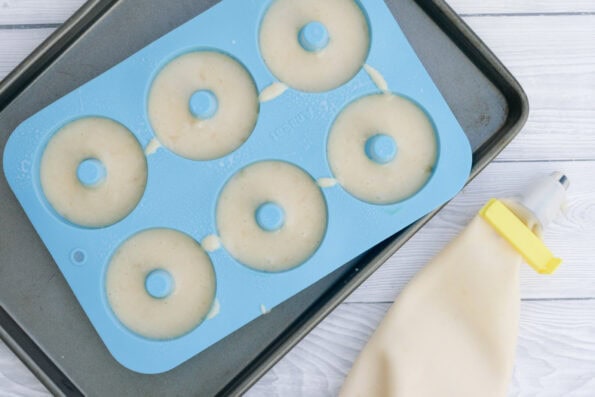 a doughnut pan with batter in it.