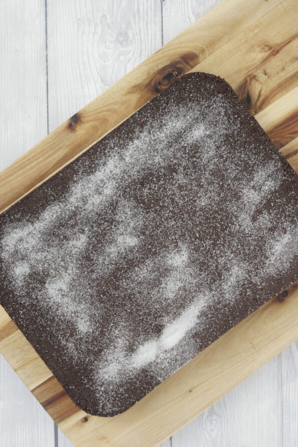 chocolate concrete on a wooden serving board.