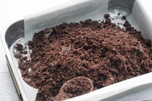 chocolate crunch mixture in a baking tin.